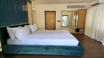 yanuma bedroom in brick mansion villa